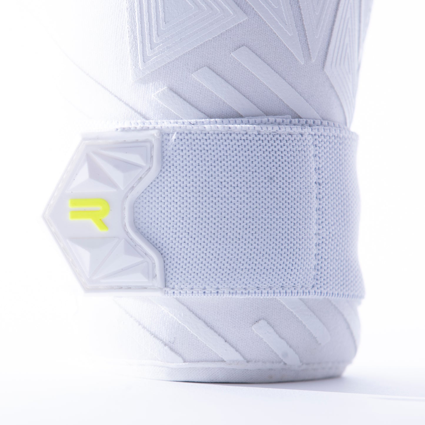 White and neon yellow goalkeeper glove