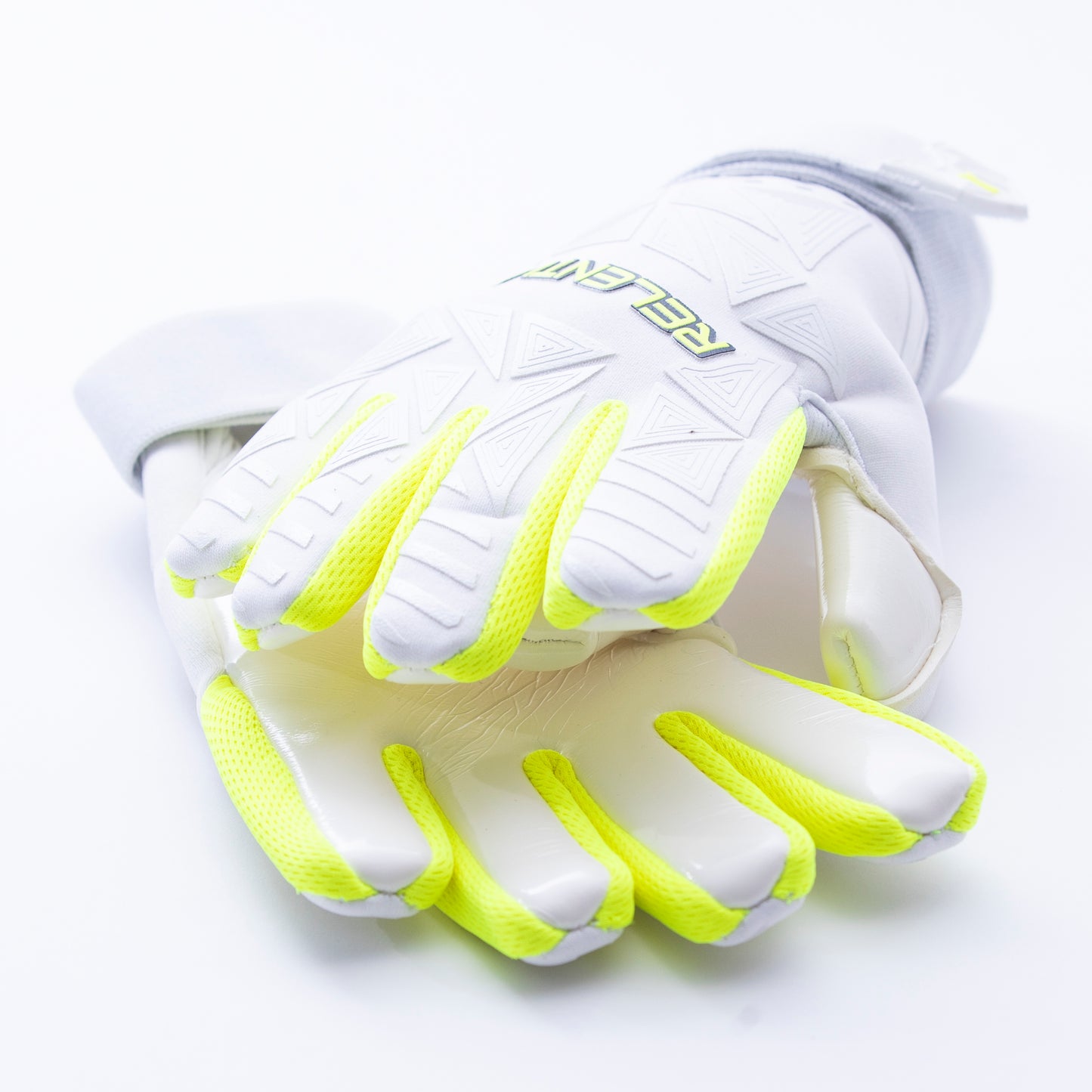 White and neon yellow goalkeeper glove